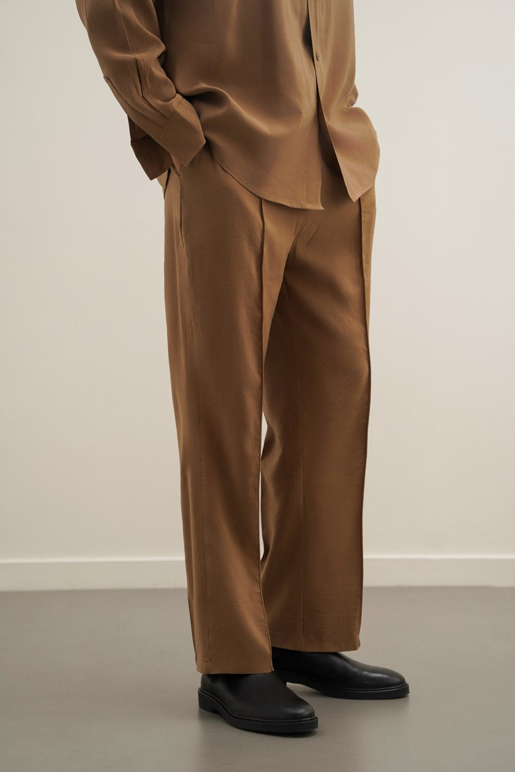 STONEWASH PLEATED TROUSERS
